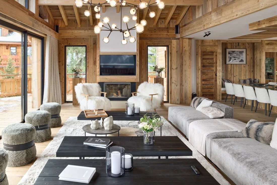 Living room of the ski-in ski-out chalet in Courchevel 1850 — Chalet Hilary Alps Rental, Courchevel 1850