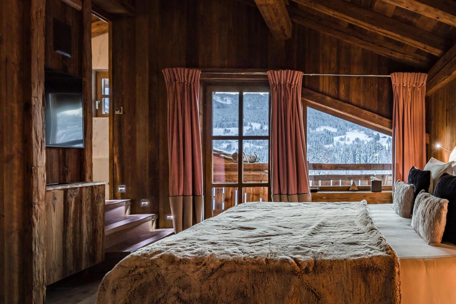 Camera da letto dello chalet con servizio completo a Megève