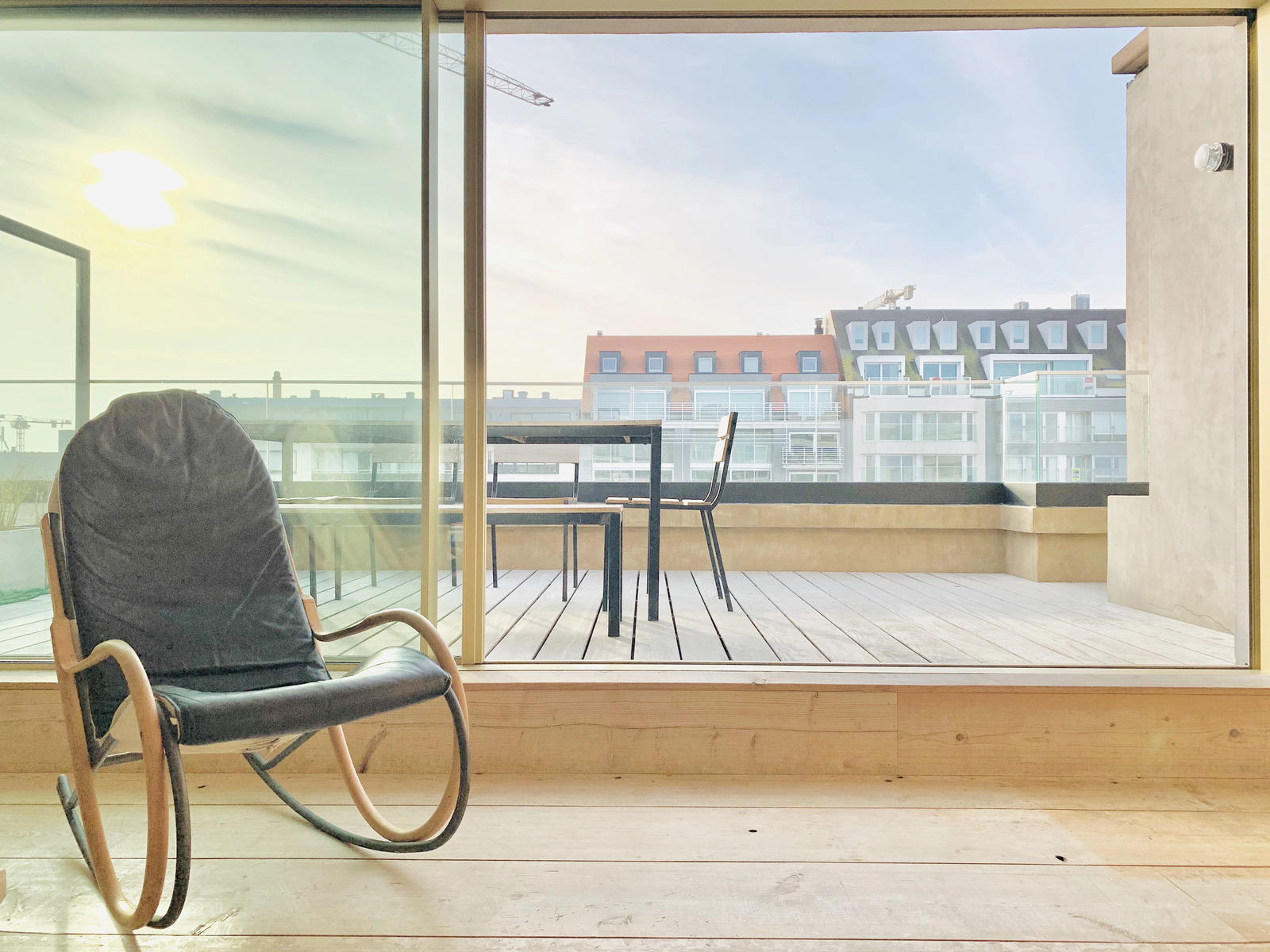 Knokke penthouse made from two merged apartments, with natural light
