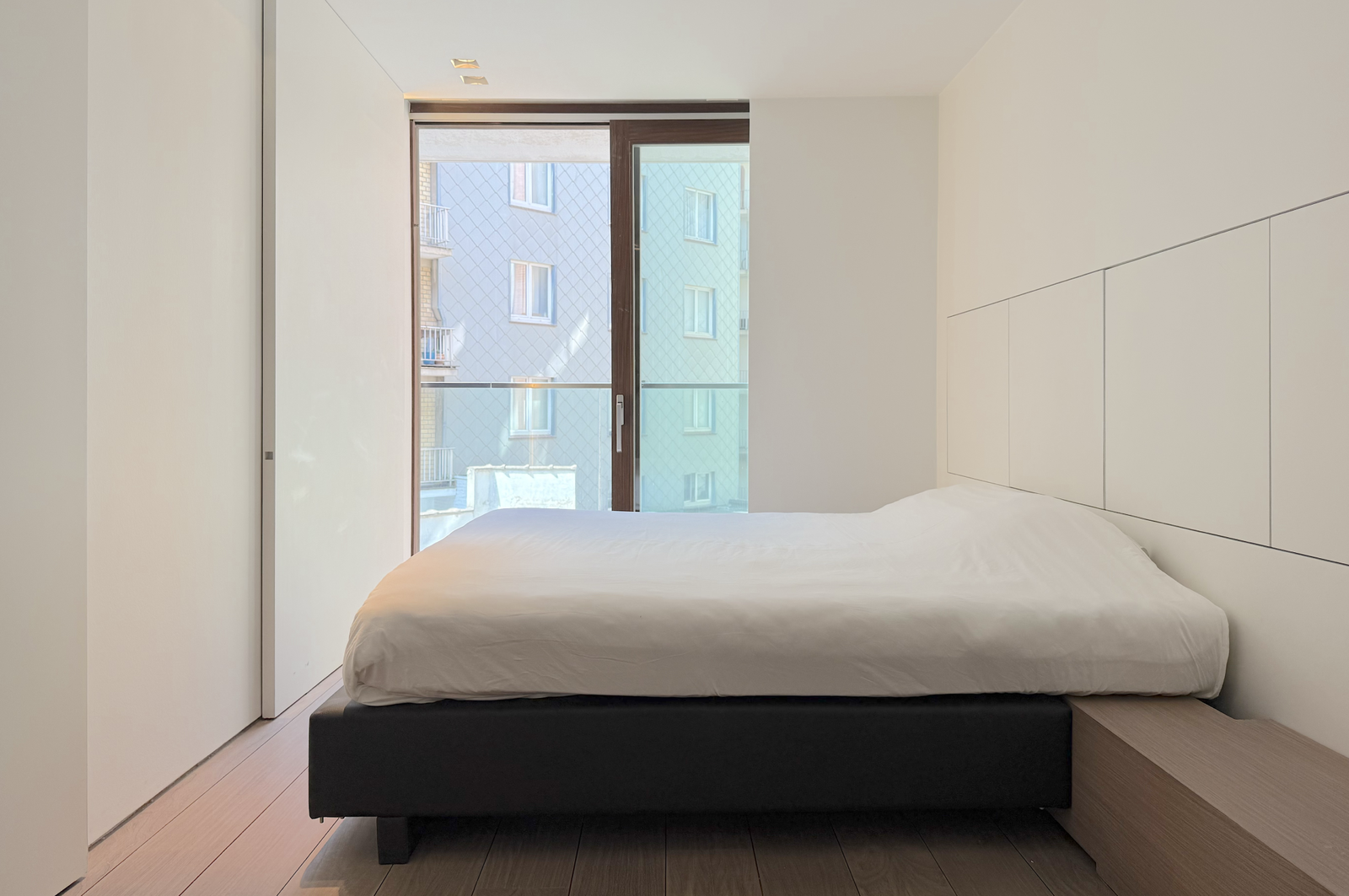 Slaapkamer van het appartement aan het strand in Knokke